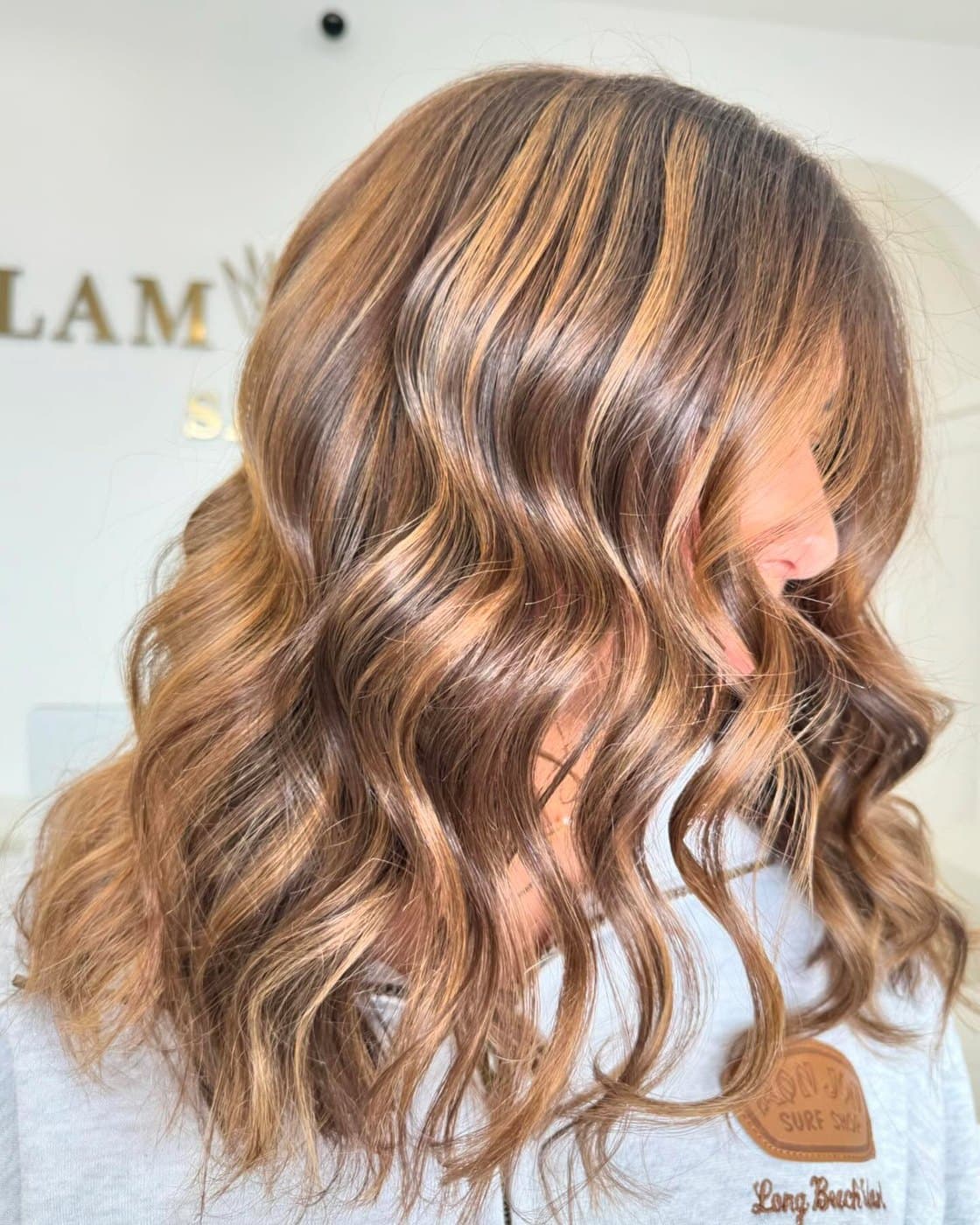 Sun-kissed blonde balayage with soft waves